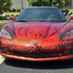 Illustration for article titled Sharpie-wielding tattoo artist turns Corvette into tribal sleeve